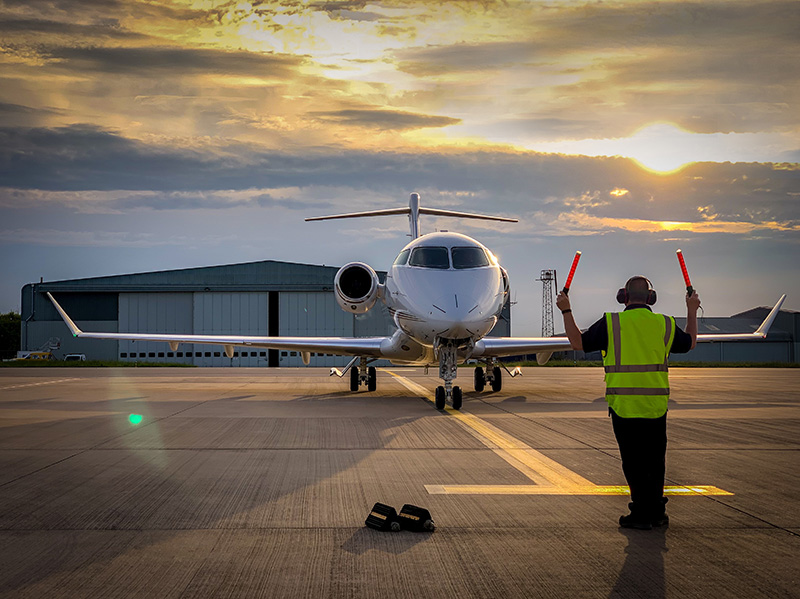Insured jet near hanger